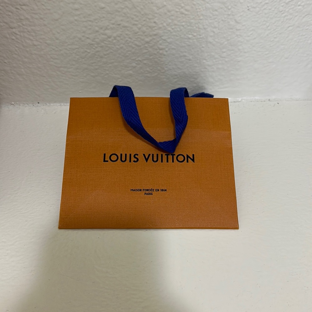 Louis Vuitton mini and medium shopping bag for perfumes and belts and wallets